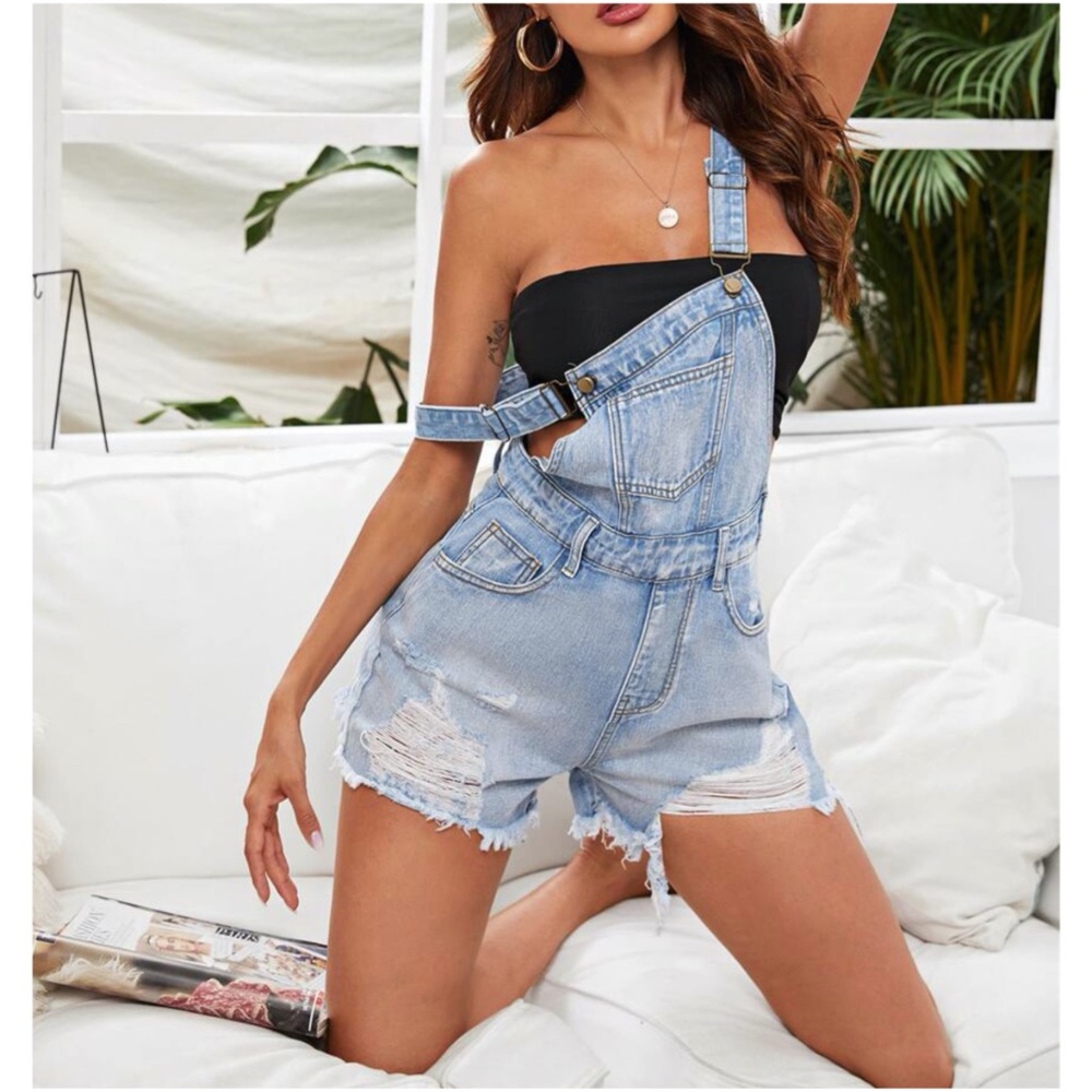Distressed denim overalls